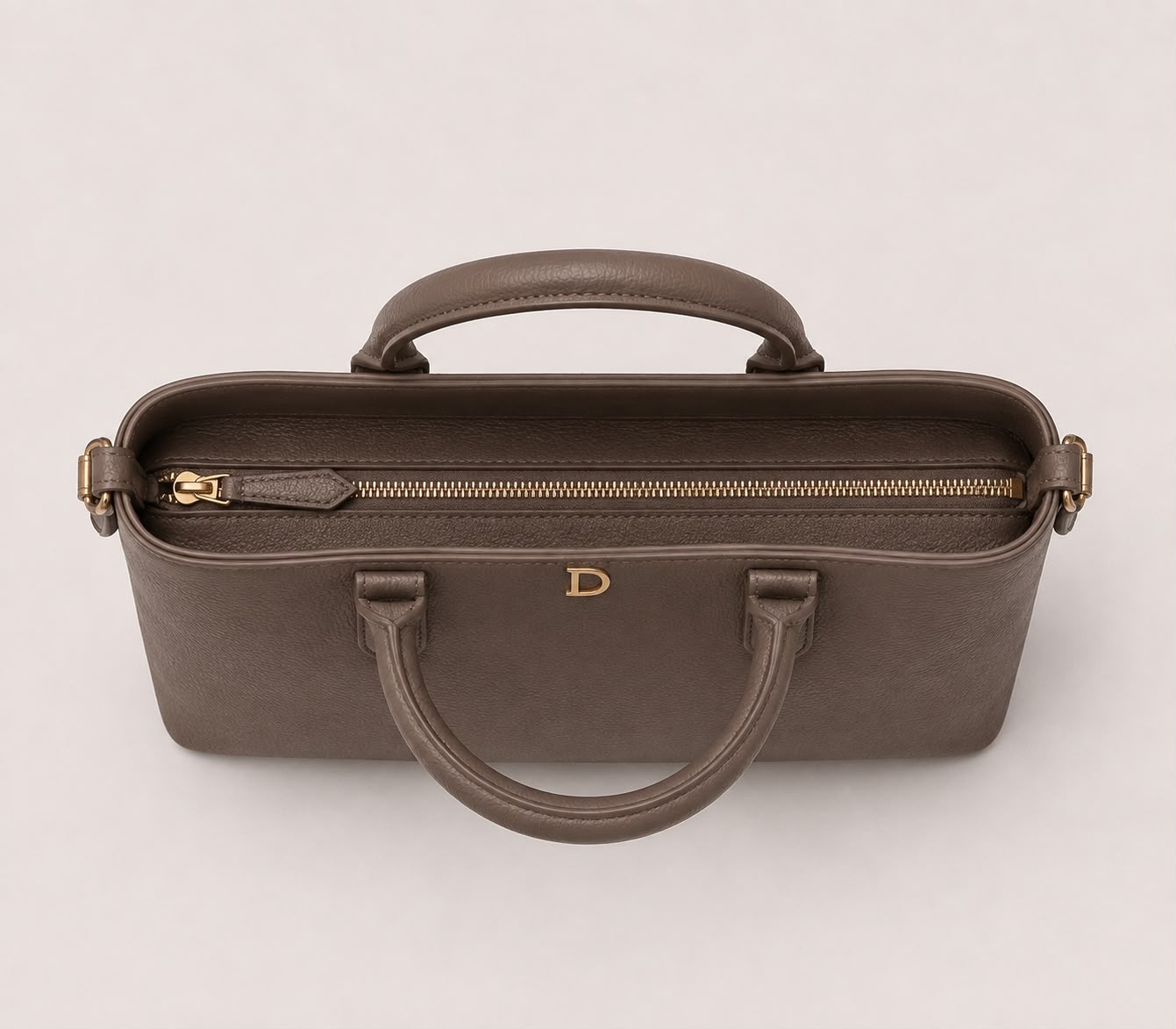 DiSheri taupe leather tote, open interior showing organization pockets